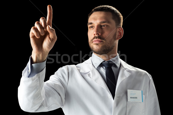 doctor or scientist in white coat Stock photo © dolgachov