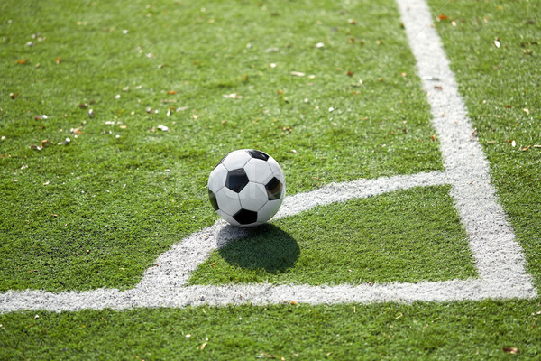 soccer ball on football field Stock photo © dolgachov