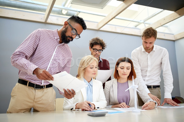 business people discussing green energy project Stock photo © dolgachov