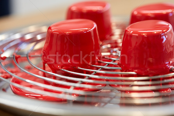 Stock photo: mirror glaze cakes at pastry shop