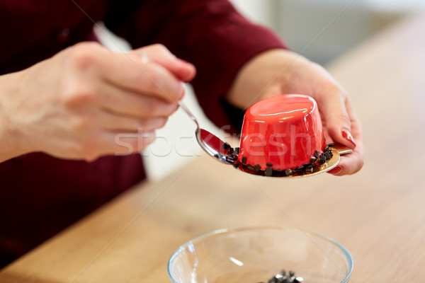 chef decorating mirror glaze cakes at pastry shop Stock photo © dolgachov