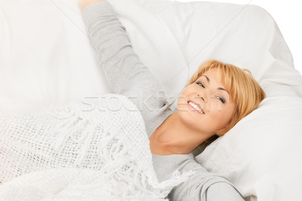 woman in bed Stock photo © dolgachov