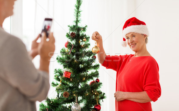 Boldog idős nő karácsonyfa ünnepek emberek Stock fotó © dolgachov