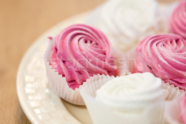 close up of zephyr or marshmallow dessert on plate Stock photo © dolgachov