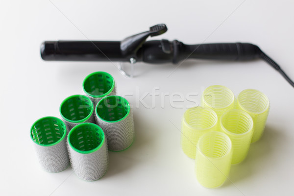 hair curlers or rollers and iron or hot styler Stock photo © dolgachov