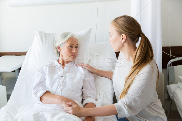 daughter visiting her senior mother at hospital Stock photo © dolgachov