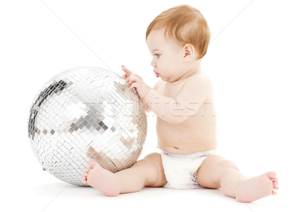 adorable baby boy with big disco ball Stock photo © dolgachov