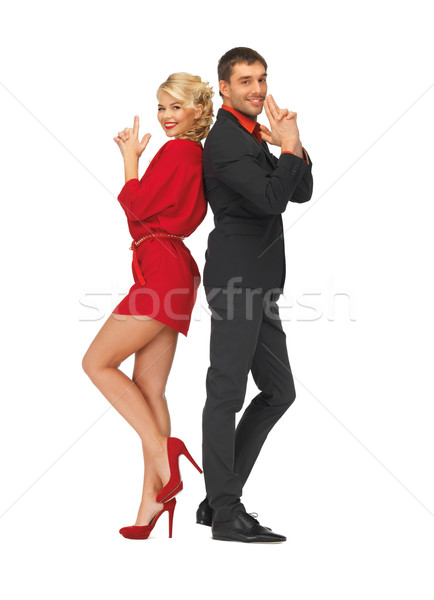 man and woman making a gun gesture Stock photo © dolgachov