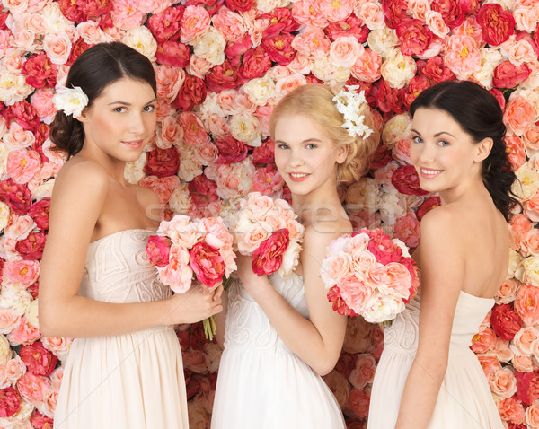 Drei Frauen voll Rosen schönen Frau Stock foto © dolgachov