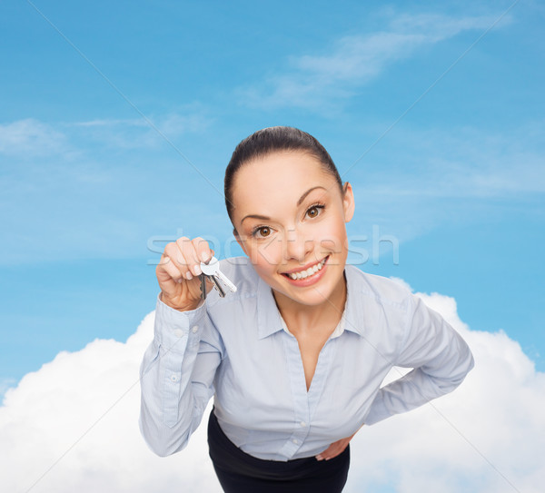 улыбаясь деловая женщина дома ключами бизнеса недвижимости Сток-фото © dolgachov