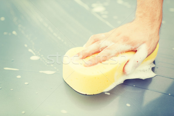 man washing a car Stock photo © dolgachov