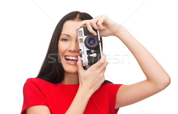 Femme souriante photos appareil photo numérique modernes technologie [[stock_photo]] © dolgachov