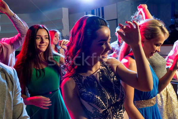 Gülen arkadaşlar dans kulüp parti tatil Stok fotoğraf © dolgachov