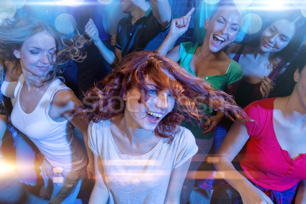 Lächelnd Freunde Tanz Club Party Feiertage Stock foto © dolgachov