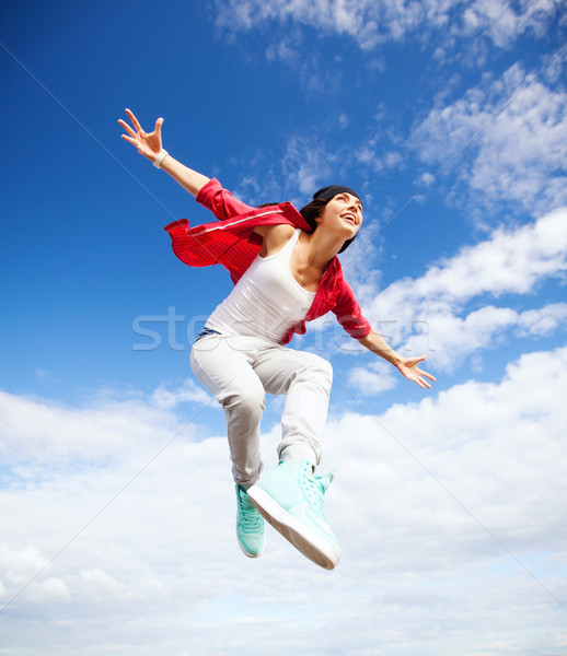 Belo dança menina saltando esportes urbano Foto stock © dolgachov
