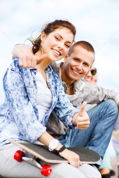 teenages with skateboard outside Stock photo © dolgachov