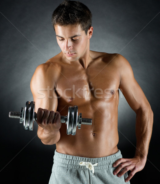 Junger Mann Hantel Sport Bodybuilding Ausbildung Menschen Stock foto © dolgachov
