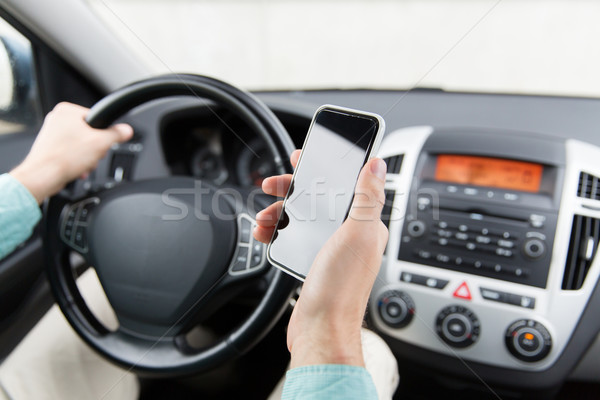 Stockfoto: Man · hand · smartphone · rijden · auto