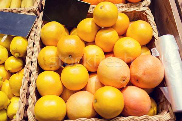 Stock photo: ripe grapefruits at food market