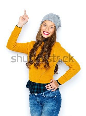 Stockfoto: Gelukkig · jonge · vrouw · tienermeisje · wijzend · vinger · omhoog