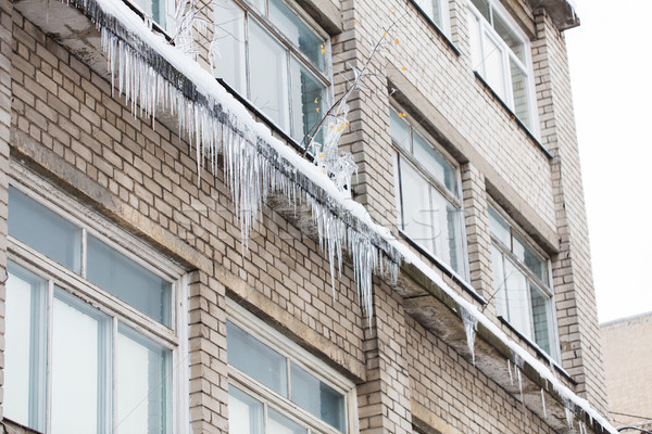 icicles on building or living house facade Stock photo © dolgachov
