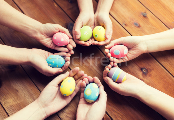 close up of woman hands with colored easter eggs Stock photo © dolgachov