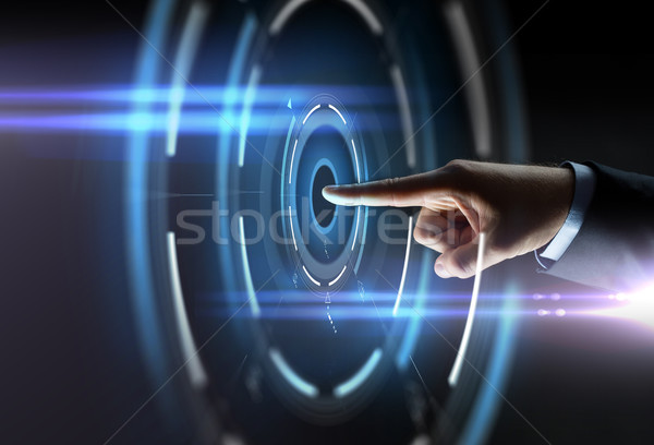 Masculina mano senalando dedo virtual proyección Foto stock © dolgachov