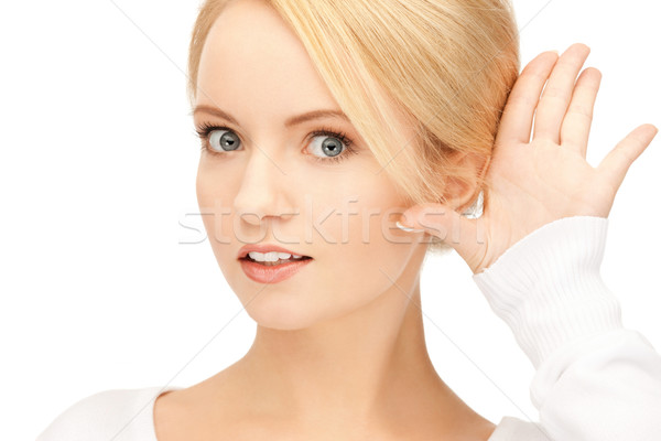 Mulher escuta fofoca brilhante quadro mulher jovem Foto stock © dolgachov