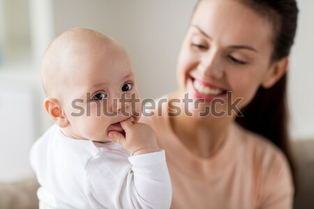 happy mother with little baby boy at home Stock photo © dolgachov