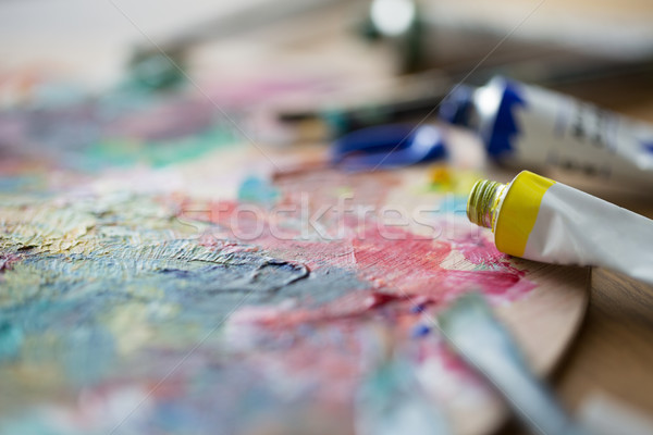 acrylic color or paint tubes and palette Stock photo © dolgachov