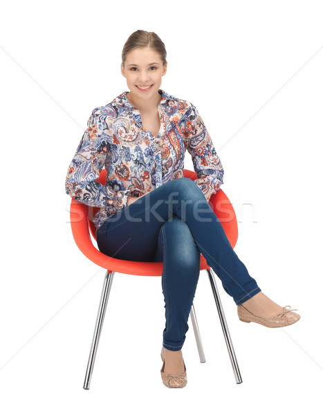 快樂 暢快 十幾歲的女孩 椅子 光明 圖片 商業照片 © dolgachov