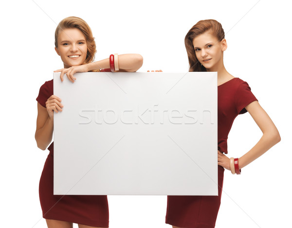 Dois vermelho vestidos conselho quadro Foto stock © dolgachov