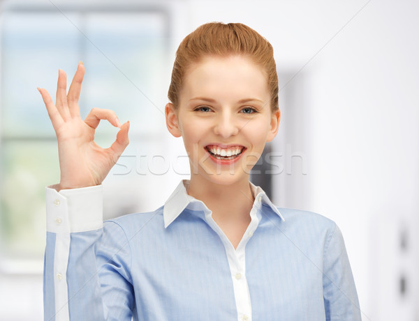 Stock photo: young woman showing ok sign