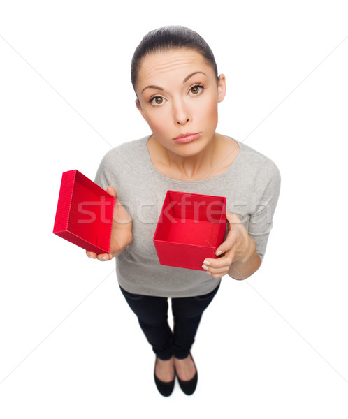 Enttäuscht asian Frau leer rot Geschenkbox Stock foto © dolgachov