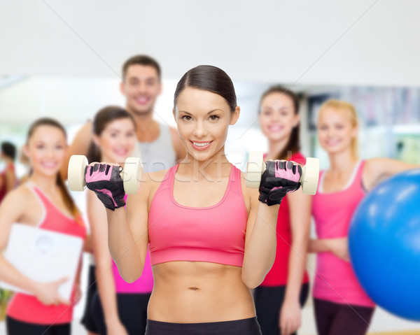Personal trainer grup spor salonu uygunluk spor eğitim Stok fotoğraf © dolgachov