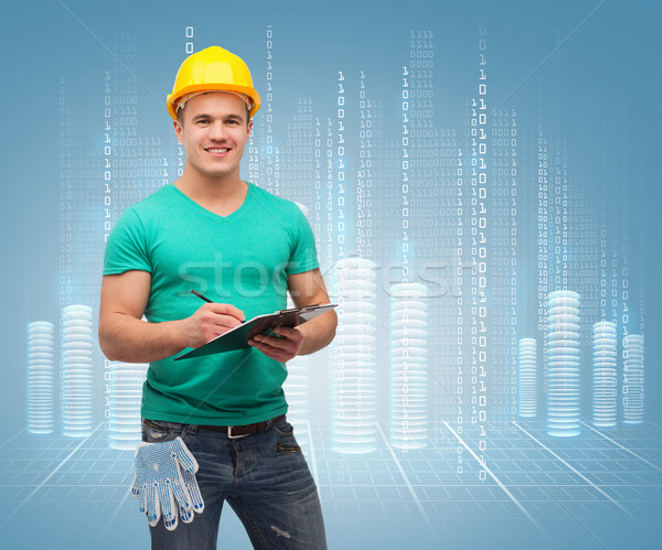 Foto stock: Sonriendo · hombre · casco · portapapeles · reparación · construcción