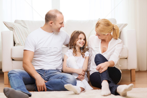 Szülők kislány ül padló otthon család Stock fotó © dolgachov
