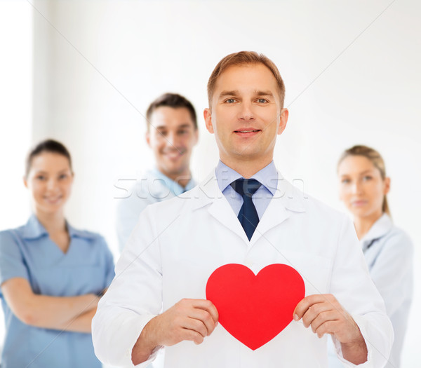 Sorridere medico di sesso maschile rosso cuore medicina professione Foto d'archivio © dolgachov