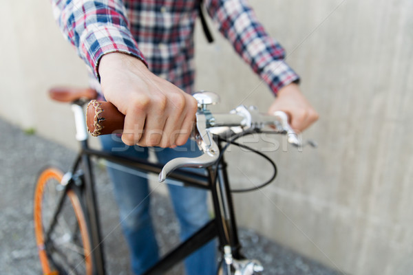 Homme fixé engins vélo sac à dos [[stock_photo]] © dolgachov