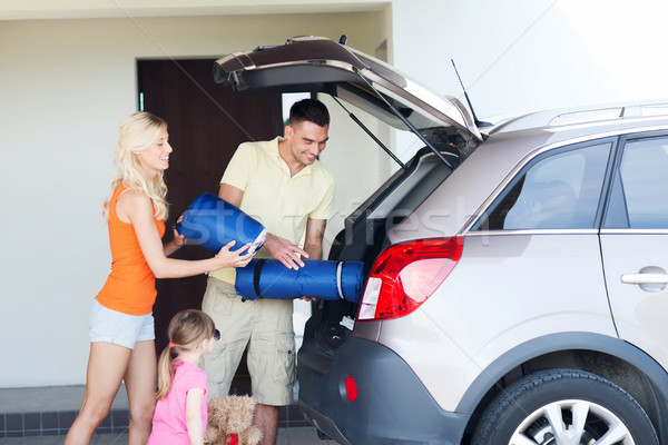 Famille heureuse choses voiture maison parking [[stock_photo]] © dolgachov