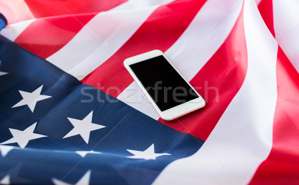 Smartphone amerykańską flagę technologii amerykański dzień Zdjęcia stock © dolgachov