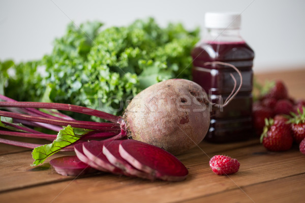 bottle with beetroot juice, fruits and vegetables Stock photo © dolgachov