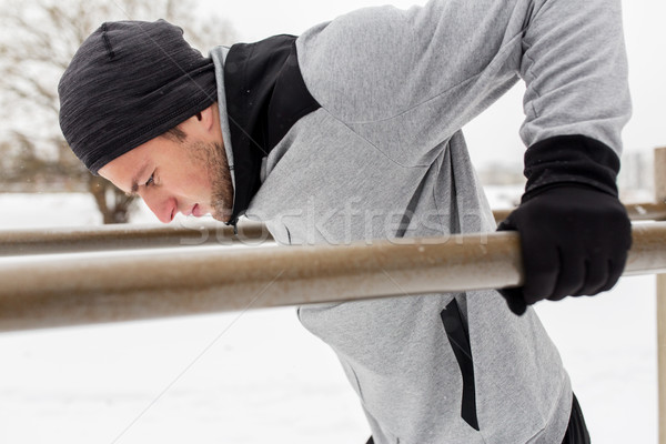 Stockfoto: Jonge · man · parallel · bars · winter · fitness