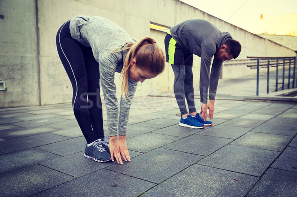 Stock fotó: Pár · nyújtás · görbület · előre · utca · fitnessz