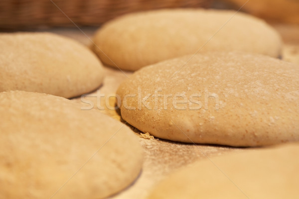 close up of yeast bread dough at bakery Stock photo © dolgachov