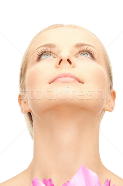 beautiful woman with lotus flower Stock photo © dolgachov