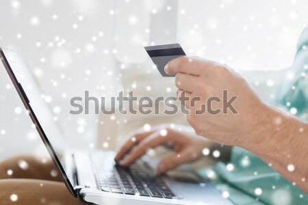 senior man with glucometer checking blood sugar Stock photo © dolgachov