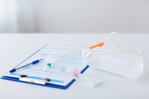 close up of medical report and drop counter Stock photo © dolgachov