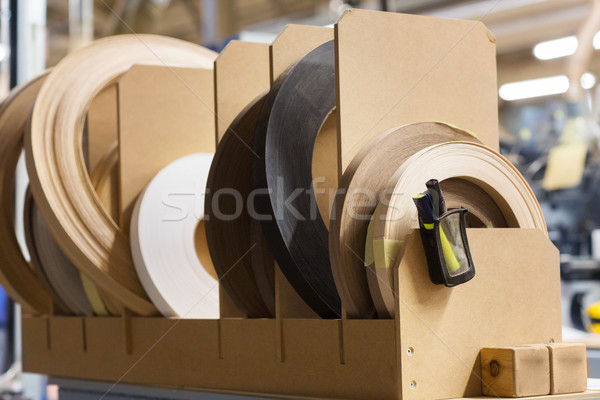 veneer or edge band tapes at woodworking factory Stock photo © dolgachov