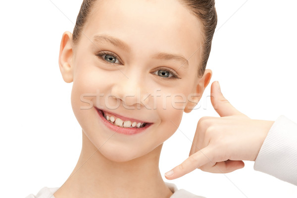 teenage girl making a call me gesture Stock photo © dolgachov